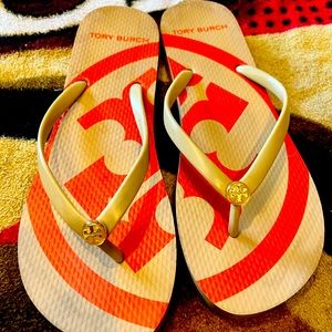Size 9. Used Tory flip flops